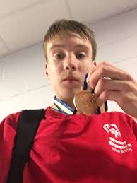 Roger Williams University hockey team hosts lavender game for testicular  cancer