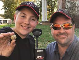 Michael B and his son Reese from Kentucky, went for an afternoon hunt and  found a fascinating piece of history, a Kentucky Militia Civil War button  circa 1850 with their AT Max!