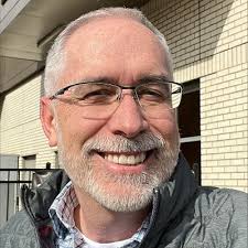 WOW! 4 Years. Kris Eggert and myself holding our first check under the Evo… 