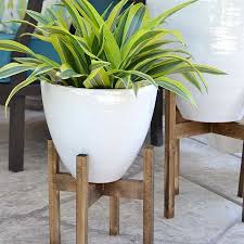 Use this idea to create diy concrete planters and diy plant stands for them. 12 Free Diy Plant Stand Plans