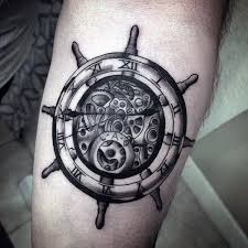 One of the classic nautical tattoo combinations is an anchor and compass. 70 Schiffsrad Tattoo Designs Fur Manner Eine Sinnvolle Reise Mann Stil Tattoo Ship Wheel Tattoo Knee Tattoo Tattoos For Guys