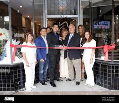 CorpoBello president David Diaz and Coral Gables Mayor Jim Cason are seen  during the grand opening of CorpoBello Anti Aging and Wellness Center in  Coral Gables,