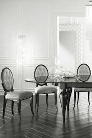The perfect centerpiece for your ensemble, it showcases an understated silhouette. 15 Astonishing Oval Dining Tables For Your Modern Dining Room Modern Dining Tables Luxury Dining Room Luxury Dining Dining Room Design Modern