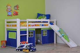 half hoogslaper met glijbaan dit stoere glijbaan bed van thuka hit is uitgerust met een blauw groen speelgordijn peuterkamer meisjes glijbaan bed met glijbaan