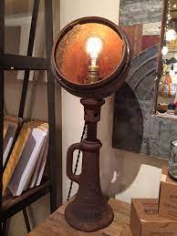 The Junk Girls Provide Plum Goods With Original Vintage Lighting This One Is Made From An Old Car Jack Vintage Lighting Industrial Lamp Car Jack