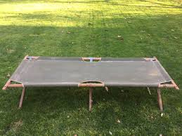Whether you have an expansive garden or a modest courtyard, your outdoor living space should feel like an extension of your home—with quality furniture, plush cushions, and luxurious furnishings. Vintage Army Cot Military Cot Display Canvas Cot Prop Etsy Wood Cot Camping Cot Wood Pieces