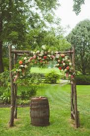 Best diy wood wedding arch from handcrafted timber wedding arch. Wooden Wedding Arch With Coral Flowers