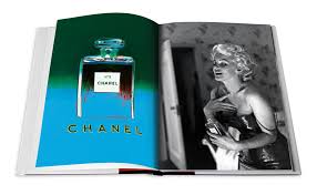 There are 750 coffee table books fashion for sale on etsy, and they cost $46.07 on average. Chanel 3 Book Slipcase Copper Plush