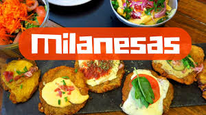 Aunque normalmente se comen tal cual, fritas u horneadas, también cuentan con muchísimas versiones que añaden más ingredientes. Eating Milanesa In Buenos Aires Argentina Youtube