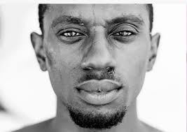 ABOUT — RAYMOND EJIOFOR