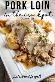 Pork tenderloin, onion, garlic cloves, large carrots, russet potatoes. Crock Pot Pork Loin Just Set Forget Kylee Cooks