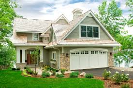 Exterior brings together lap siding and stone veneer accents with welcoming timber columns and entry truss. 75 Beautiful Craftsman Stone Exterior Home Pictures Ideas July 2021 Houzz