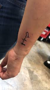 Instagram Ftmyerstattoo Brian Stabile1975 Faithhopeandlovetattoo Faithhopelove Tattoo Smalltattoos Br In 2020 Small Tattoos Tattoos For Women Wrist Tattoos Words