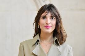 To keep the pieces away from your face, use a hot round brush to lift and. How To Cut Curtain Bangs And Style Them Yourself Glamour