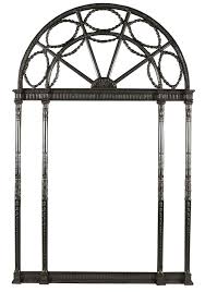 Tempered, beveled glass floats above faux wood frame. Lot Hollywood Regency Silvered Pier Console Mirror