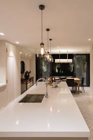 Modern white kitchen with wooden pendants. 51 Best Kitchen Lighting Ideas Kitchen Lighting Kitchen Remodel Kitchen Design