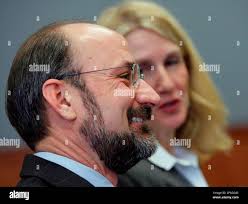 Attorney Michael Craddock, left, sits with his wife, Ramona, as they listen  during a hearing by members of the School Land Board Tuesday, Feb. 5, 2008,  in Austin, Texas. The Texas land
