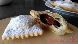 Io ho usato un uovo di cioccolato al latte: Bugie Di Panna Ripiene Di Nutella Ricette In Armonia