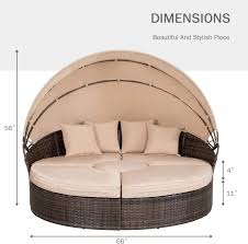 An outdoor daybed can be a special part in your house. Outdoor Patio Round Daybed With Retractable Canopy Brown Wicker Furniture Clamshell Sectional Seating With Washable Cushions