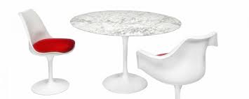 The tulip's sleek and simple shape pairs well with any of our modern dining chairs for your own unique dining experience. Tulip Dining Table By Eero Saarinen A Steelform Design Classic