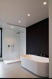 mooie balans tussen architecturale eenheid en eigenheid in dit duoproject badkamer modern modern badkamerontwerp badkamerdecoratie
