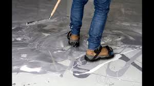 Installers mix the two component epoxy resin with the desired decorative aggregate if used and then pour the material onto the slab. Video Guide 12 How To Paint A Marble Epoxy Floor Coating Youtube