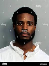 RETRANSMITTING TO CORRECT THAT THE SUSPECT'S LAST NAME IS DAVIS, NOT DAVID  This image provided by the Miami-Dade Police Department shows Tamarius Blair  Davis Jr., who fatally shot a tourist eating dinner
