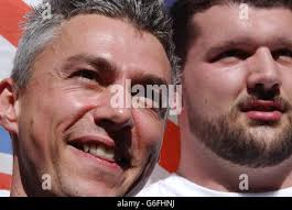 Britain's world record triple jump holder Jonathan Edwards looks back at  the pit after failing to jump the required 17 metres to automatically  qualify for tomorrow (Saturday) night's final. Edwards still went