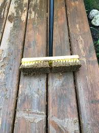 Repair or replace defective and rotted planks before you restain the deck. How To Strip Clean Stain And Seal An Old Deck For Cheap Part 1