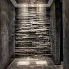 By keeping the walls and the vanity simple and neutral, the designer is able to experiment with the shower and floor tiles and create a load of visual interest with this starburst pattern. 1