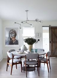 The Designer Trick That S Going To Take Your Dining Room To The Next Level Minimalist Dining Room Dining Room Design Round Dining Table