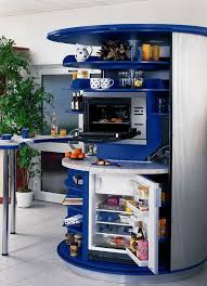 The circle kitchen is designed and created by the german company compact concepts, and it on the lower half the circle kitchen is a dishwasher, small refrigerator, and tons of storage space. Revolving Circle Compact Kitchen Idesignarch Interior Design Architecture Interior Decorating Emagazine Space Saving Kitchen Compact Kitchen Design Compact Kitchen