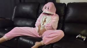 Girl in bunny onesie masturbating on couch