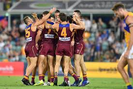 Players are listed in order of debut, and the start of their brisbane lions career is determined by this guideline results in the possibility that players may not have necessarily begun or finished their. Brisbane Lions Celebrate Goal Against West Coast Eagles Abc News Australian Broadcasting Corporation