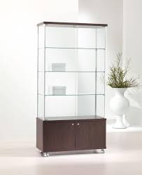 We hold valuable certifications available to cabinet distributors/designers. Modern Showcase Glass Shelves 2 Door Base Cabinet With Wheels For Shops Idfdesign