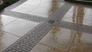 The noon paver system as a wood finish look that works well for walkways, patios, driveways, and pools. Concrete Driveways Driveway Repairs Decorative Concrete Driveways Concrete Pavers Tom Ralston Concrete