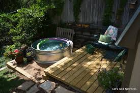 How To Make Your Own Stock Tank Pool This Summer