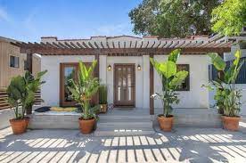 A wedding arbor is an easy way to personalize an outdoor wedding and define the ceremony site within the open space. Adorable 1 Bedroom Spanish Style Interiordesign Tinyhouses Spanishstylehome Trellis Architectu Spanish Style Homes Hacienda Style Homes Spanish Style Home