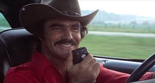 Keith (Cherokee) Jones and another vigilante lighting cigarette