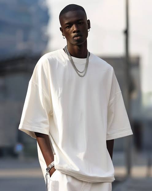 Heavyweight cotton creates a rigid, structural drape that maintains its shape throughout the day, AI generated
