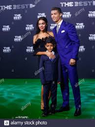 Ronaldo is able to play on both wings and also as a striker since he is very strong with both feet, even though he is naturally right footed. Real Madrid S Cristiano Ronaldo Son Cristiano Ronaldo Jr Stock Photo Alamy