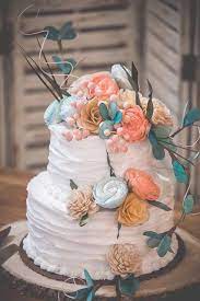Wood flowers for wedding cake. Wedding Cake Sola Wood Flowers Added To A Wedding Cake Sola Wood Flowers Wood Flowers Wholesale Wedding Decor