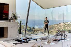 On high drive, laguna beach built in 1954 (located behind the pavilions market in north laguna) this building shows design influence from frank lloyd wright, interpreted in a unique way with belgian stained glass windows and other fine details. Inside Pro Skateboarder Nyjah Huston S Zen Laguna Beach Pad Architectural Digest