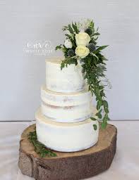 When it comes to wedding cakes, grandiose designs don't always cut it. Blog White Rose Cake Design Modern Luxurious Wedding Cakes West Yorkshire