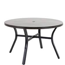 The table comes with an umbrella hole (umbrella sold separately) so you can stay comfortably shaded. 48 Metal Round Dining Table With 1 97 Umbrella Hole Black Captiva Designs Target