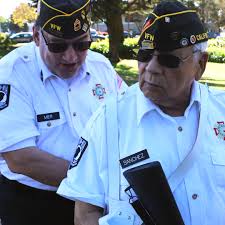 Students and staff from the SFSU Veterans Services Center joined Veterans  of Foreign Wars for a flag-raising ceremony at the front of campus,  followed by tabling
