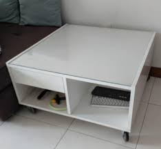 A carefully selected stack of books and magazines that. Ikea Boksel Coffee Table With Storage And Glass Top Plate Furniture Shelves Drawers On Carousell