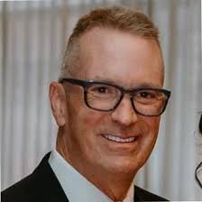 Dennis J. Madigan, CMA