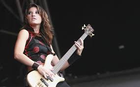 I know that i know it's been a long time coming and the tables' turned around cause one of us is goin' one of us is goin' down i'm not runnin', it's a little different now cause one of us is goin' one of us is goin' down!!! Sick Puppies Emma Anzai Just A Rock N Roll Junkie