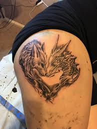 Got dragon tattoo , dragon fan tattoos game of thrones the first dragon, drogon, bears the name of dany's deceased wife, khal drogon. Wolf And Dragon Tattoo Game Of Thrones Inspired Dopeshyt Kilo Aztec Ink Elizabeth Nj Game Of Thrones Tattoo Gaming Tattoo Dragon Tattoo Game Of Thrones